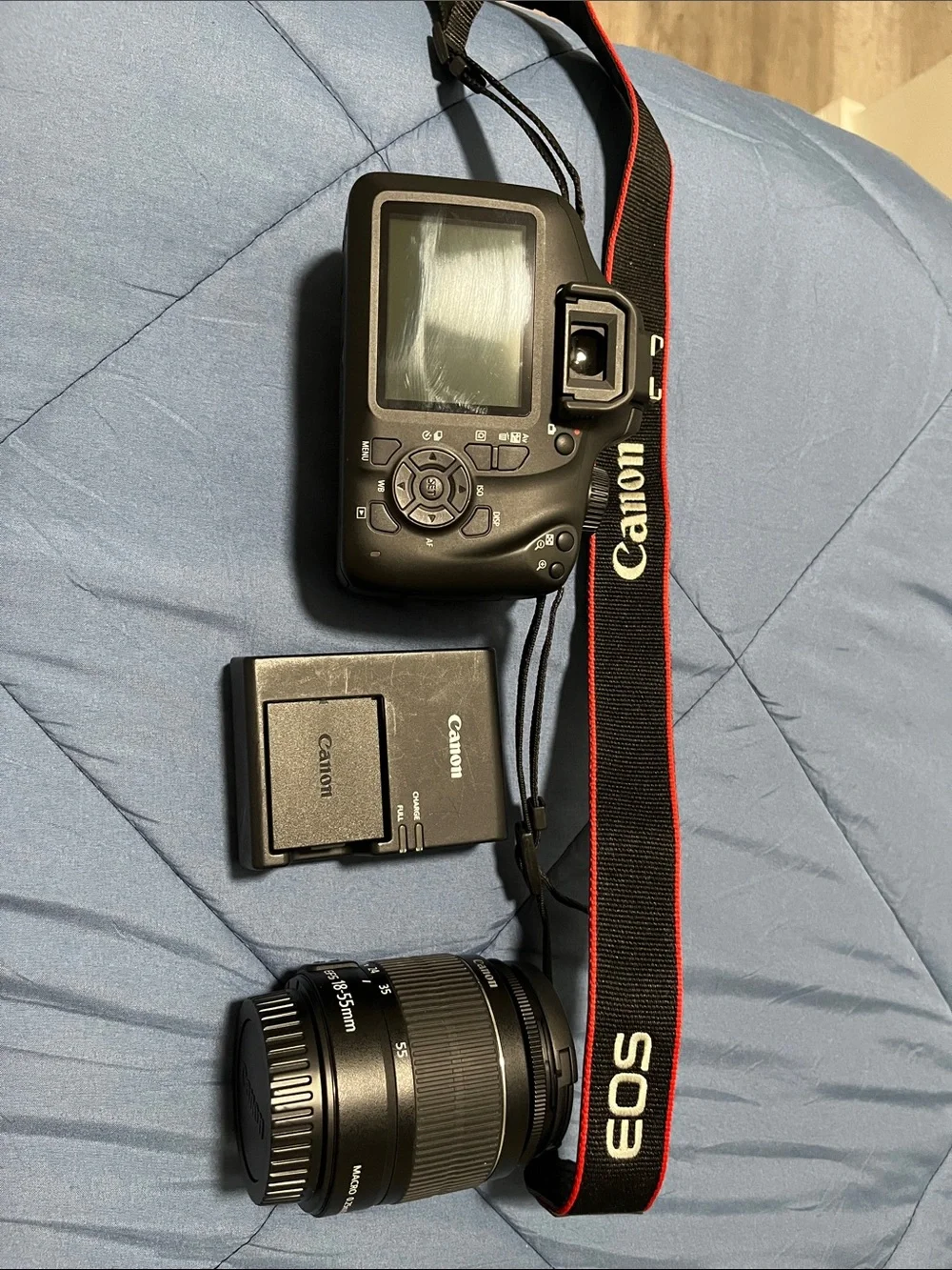 Canon Black DSLR Body with 18-55mm Lens, Charger and EOS Strap